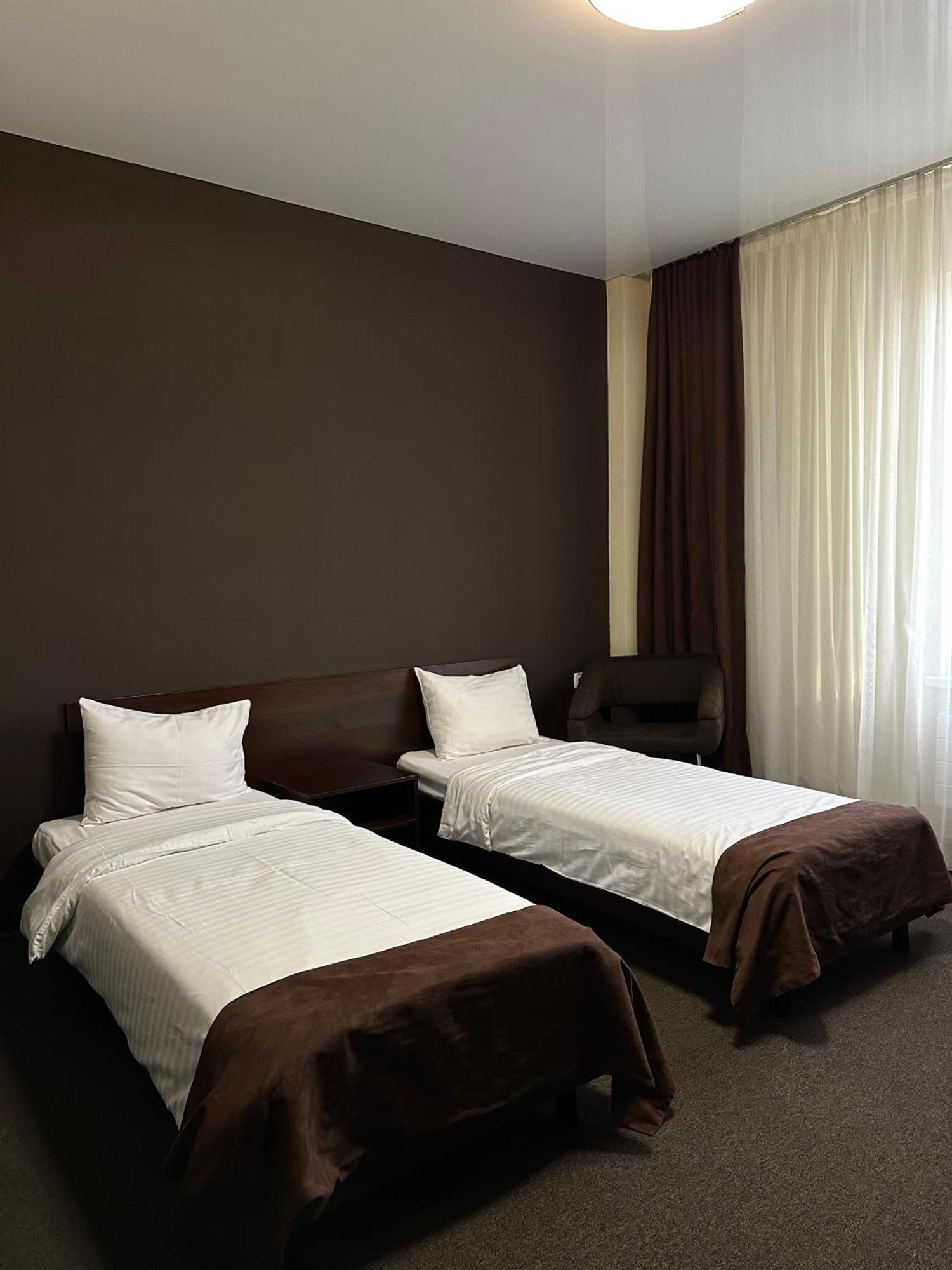 Hotel Atmosphere Poltava Habitación foto